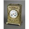 Image 1 : A 19th century brass mantel clock, 23cm Est. 150/180...