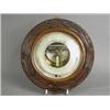 Image 1 : An Edwardian Holosteric barometer inscribed 'R. Bailey, Birmingham', in carved oak, ribbon, leaf...