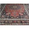 Image 1 : A large Persian rug of blue and crimson ground, 250 x 360cm (8 x 12ft) approx. Est. 200/300...