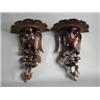 Image 1 : A pair of late 19th/early 20th century carved mahogany wall brackets, each carved with an exotic...