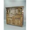 Image 1 : An 18th century oak court cupboard with a carved frieze above two cupboard doors, with two frieze...