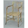 Image 1 : A Regency simulated bamboo elbow chair with painted decoration and a caned seat Est. 150/250...