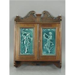 A Late Victorian Mahogany Two Door Wall Cabinet With A Pair Of