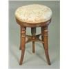 Image 1 : An early 19th century mahogany revolving stool, 33cm diameter Est. 80/120...