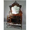 Image 1 : An Edwardian/Victorian carved walnut mirror back side cabinet, 122cm Est. 300/500...