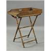 Image 1 : An oak butlers tray and turned oak stand, 70 x 42cm Est. 250/300...