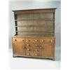 Image 1 : A 19th century oak dresser, the boarded plate rack with three graduating shelves, above three fri...