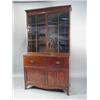 Image 1 : A George III mahogany secretaire bookcase with moulded cornice over a pair of astragal glazed doo...