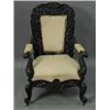 Image 1 : A 19th century Anglo Indian carved hardwood elbow chair with all over carved and pierced foliate...