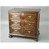 Image 1 : A late 17th century/18th century oak chest, with three panelled drawers, raised on bun feet, 90cm...