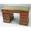 Image 1 : A late Victorian mahogany pedestal desk, the leather inset over an unusual arrangement of nine dr...