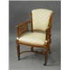 Image 1 : A Sheraton revival satinwood elbow chair, with amboyna crossbanding inlaid paterae and stringing...