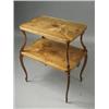 Image 1 : A Nancy School walnut etagere, the inlaid tiers decorated with flowers and berries, on reeded swe...