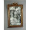 Image 1 : A George III walnut and parcel gilt wall mirror, 95cm high Est. 300/400...