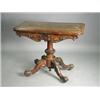 Image 1 : A Victorian rosewood foldover card table, raised on carved quadripartite legs, 92cm Est. 700/900...