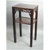 Image 1 : A 20th century Chinese hardwood two tier table, the frieze with pierced scroll decoration Est. 15...