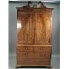 Image 1 : A good George III mahogany linen press with a swan neck cornice over two panelled doors enclosing...