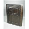 Image 1 : A late Georgian oak hanging corner cabinet with a panelled door and shaped shelves, 110cm high Es...