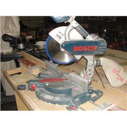 BOSCH SLIDING COMPOUND MITER SAW MOUNTED TO WOODEN ROLLING TABLE