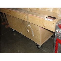 WOODEN SHOP STORAGE TABLE ON CASTERS