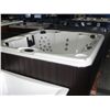 Image 1 : CAL SPAS AQUA SERIES HOT TUB WITH WHITE INTERIOR AND 7.5' WALNUT CABINET. FEATURES INC: