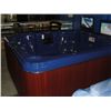 Image 1 : CAL SPAS AQUA SELECT SERIES HOT TUB WITH DEEP SEA BLUE INTERIOR AND 7.5' MAHOGANY CABINET.