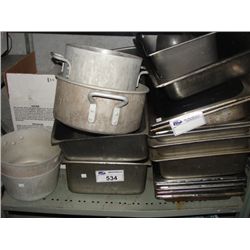 SHELF LOT OF RESTAURANT KITCHEN PANS AND POTS