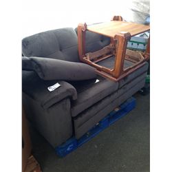 ONE SECTION OF A GREEN MICROFIBER SUEDE SOFA AND A GLASSTOP WOODEN END TABLE