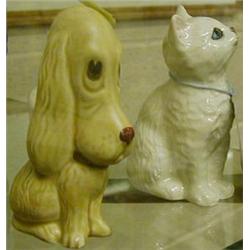 A Royal Doulton Persian kitten and a small Sylvac dog. £10-20