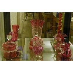 Nine items of Cranberry glass. £100-150