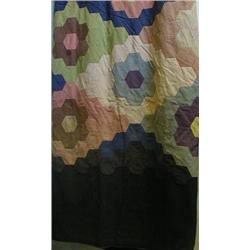Patchwork quilt made with hexagonal patches £30-50