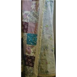 1960's patchwork quilt. Reversible with patchwork one side and light blue and floral other £30-50