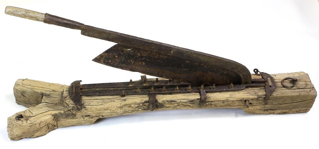Primitive Fence Cutter Large primitive cutter mounted on timber,