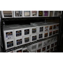 SHELF OF ASSORTED GUITAR STRINGS