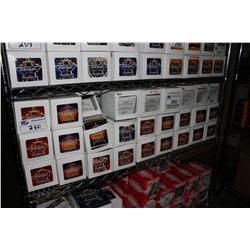 SHELF OF ASSORTED GUITAR STRINGS