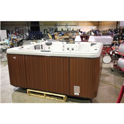 CAL SPAS ESCAPE SELECT SERIES HOT TUB WITH SAHARA INTERIOR AND 8' MAHOGANY CABINET. C/W: