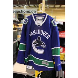 REEBOK SIZE MEDIUM VANCOUVER CANUCK JERSEY