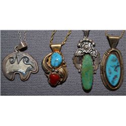 FOUR NAVAJO PENDANTS