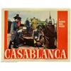 Image 1 : Casablanca (Warner Brothers, 1942). Lobby Cards (11" X 14") (2). Humphrey Bogart guns down Conrad...