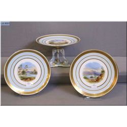 Three antique unmarked porcelain cabinet pieces including two plates and raised bowl with an interes