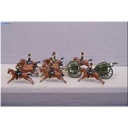 A selection of Britain's metal soldiers including gun crew with horses and cannon being pulled by fi