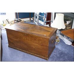 Large decorative storage chest with inlaid top and hand hammered hinges