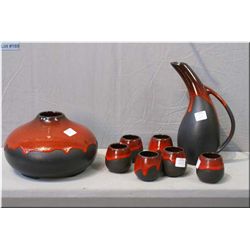 Selection of Beauce pottery including carafe with six cups and a vase