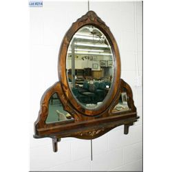 A large wood framed wall mount triple mirror and shelf etched center oval shaped mirror, and two sma