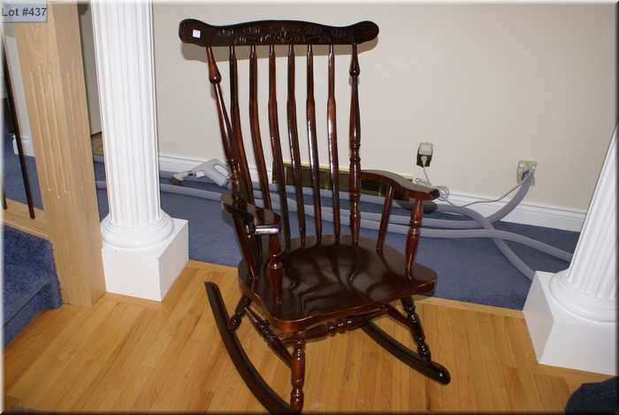 Big heavy Boston rocker with aero back and stylized fleur decoration