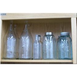 A selection of vintage collectible embossed bottles and jars including Mammy's drinks bottles, Best,