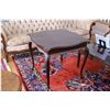 Image 1 : Large square occasional table on tall upright scroll supports