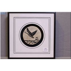 A framed etched moose antler featuring a goose and a grain elevator by artist Len Masse