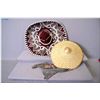 Image 1 : A Mexican sombrero and a Chinese sun hat and a large spoon and fork for the wall