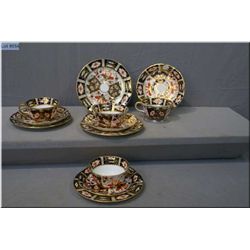 Four Royal Crown Derby Traditional Imari cups, saucers and side plates